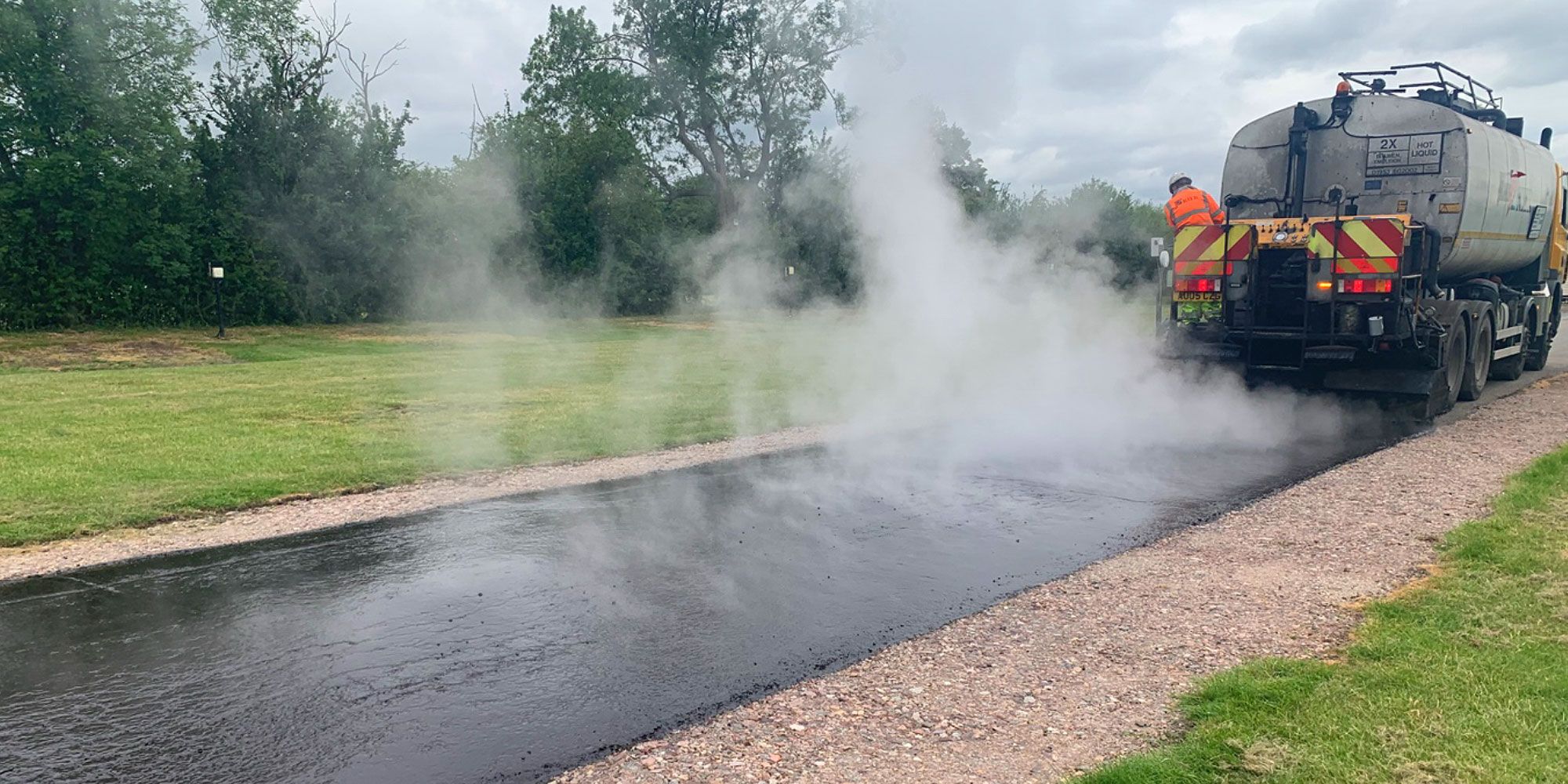 Man laying tarmac